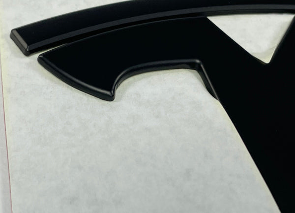 Tesla Model Y T-Logo kovové - 2dílná sada na výměnu - černá matná